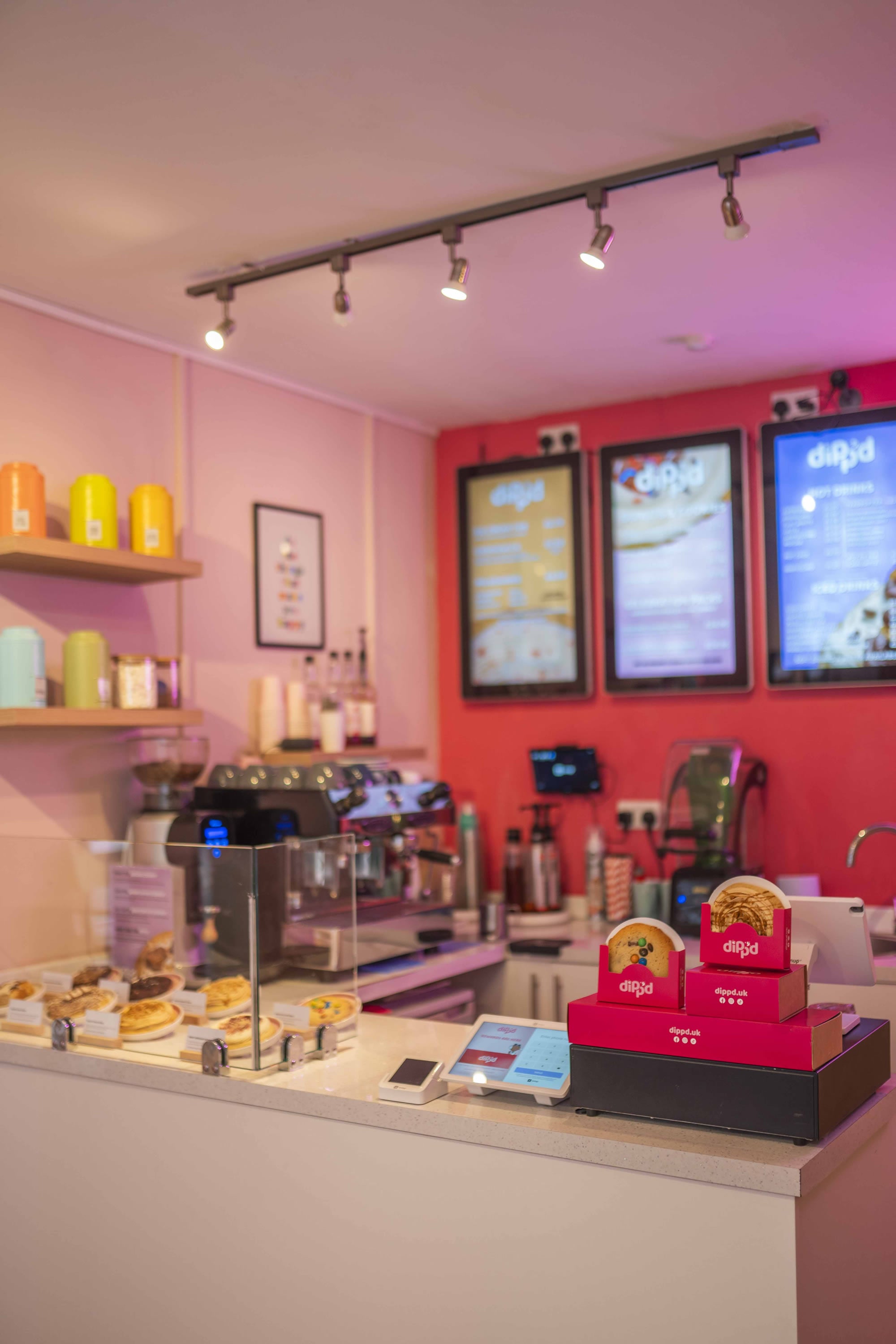 Crumbl-style cookie franchise store UK — American cookie shop interior